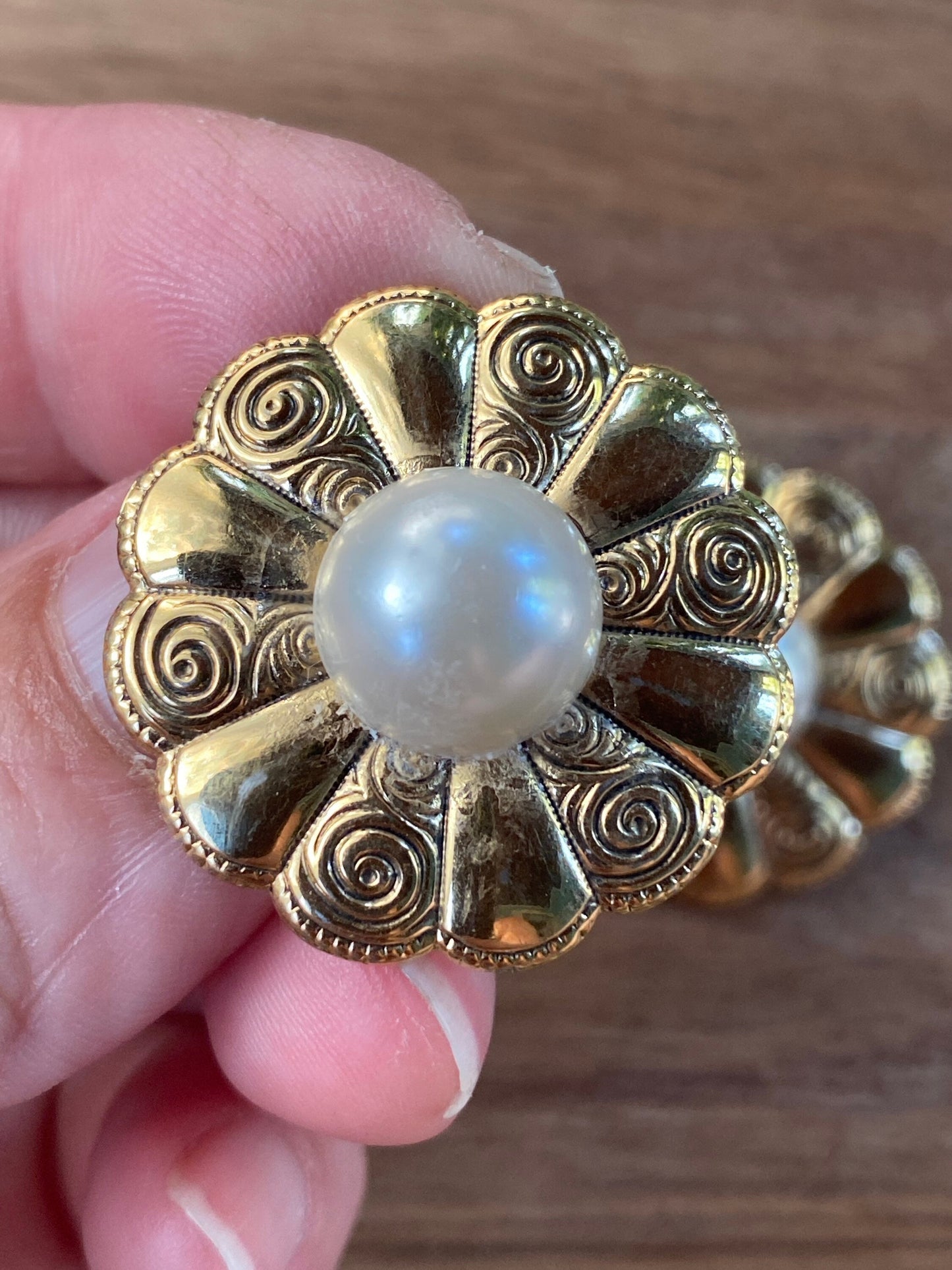 Vintage gold and faux pearl flower medallion  clip on earrings.