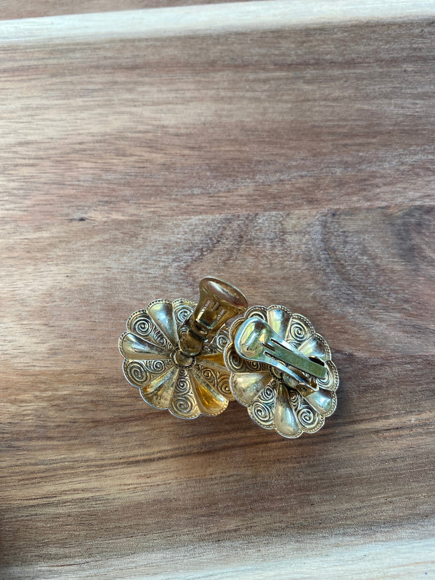 Vintage gold and faux pearl flower medallion  clip on earrings.
