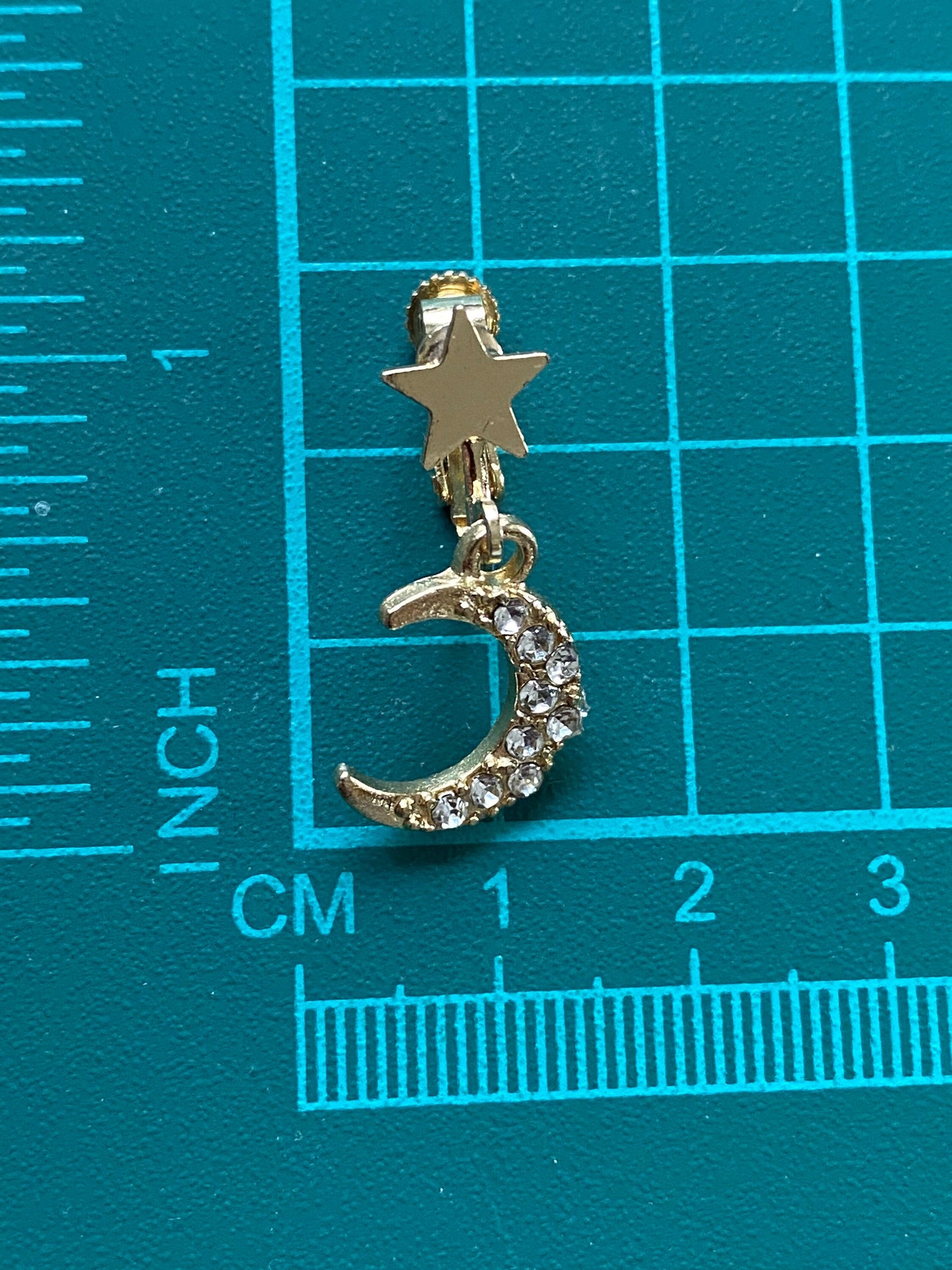 crescent shaped clip on rhinestone earrings, hinged screwback space earrings
