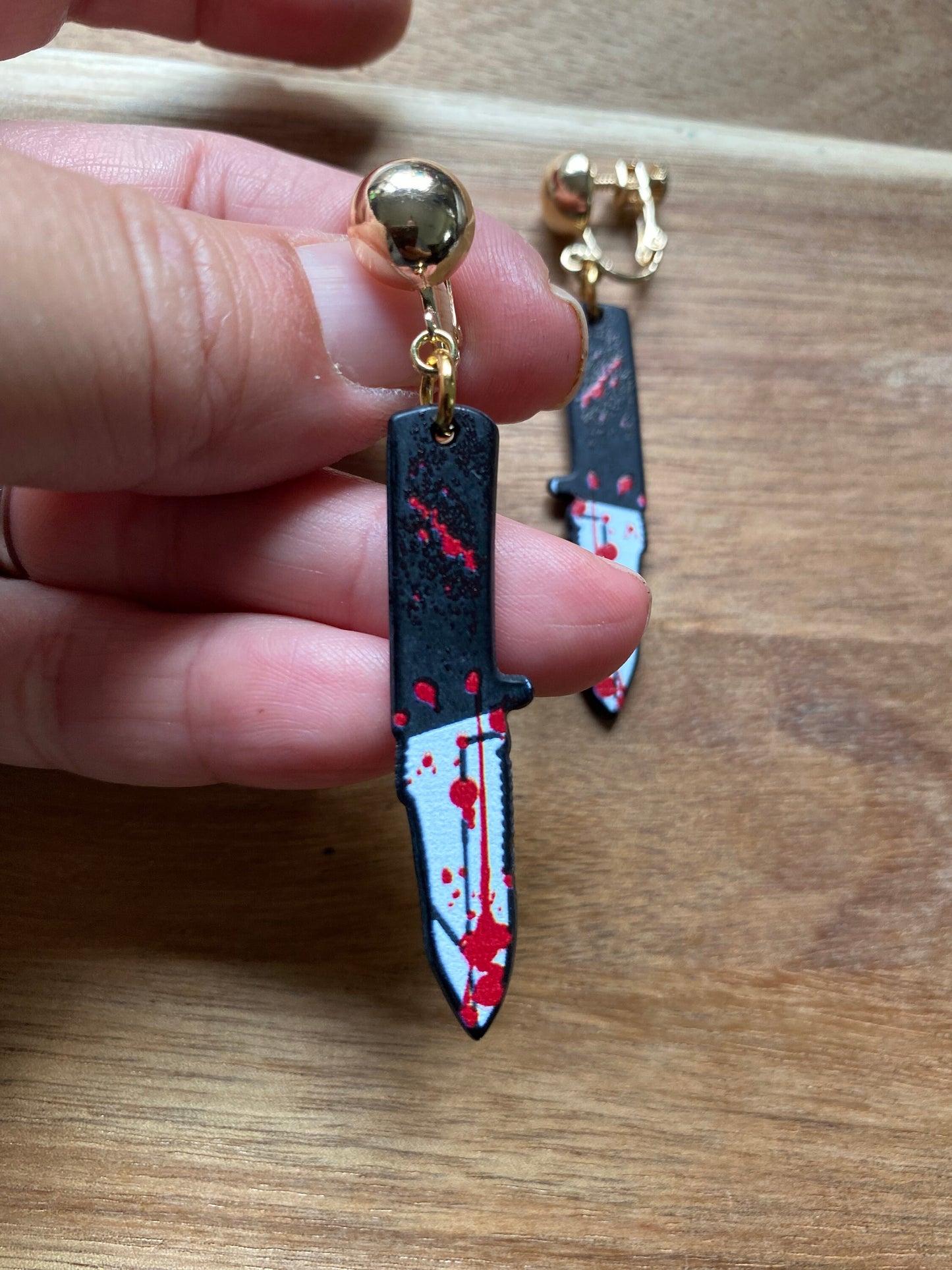 Large bloody knife clip on earrings, Halloween earrings, novelty accessories (hinged screw on closures)