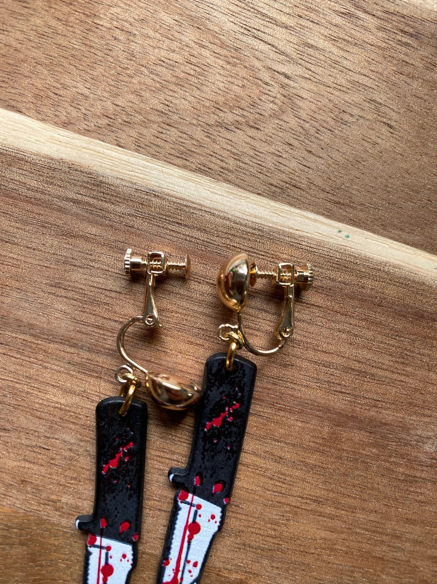 Large bloody knife clip on earrings, Halloween earrings, novelty accessories (hinged screw on closures)