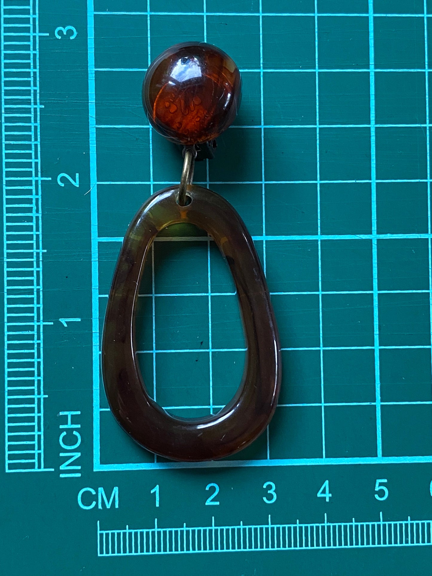 Dangling neutral hoop clip on earrings, brown tortoiseshell