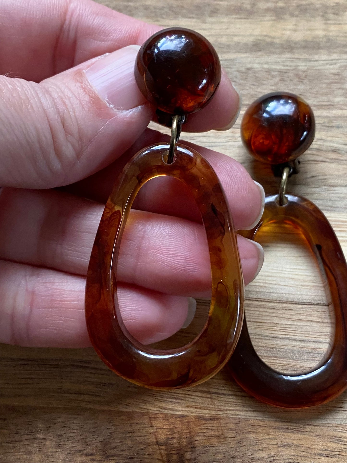 Dangling neutral hoop clip on earrings, brown tortoiseshell