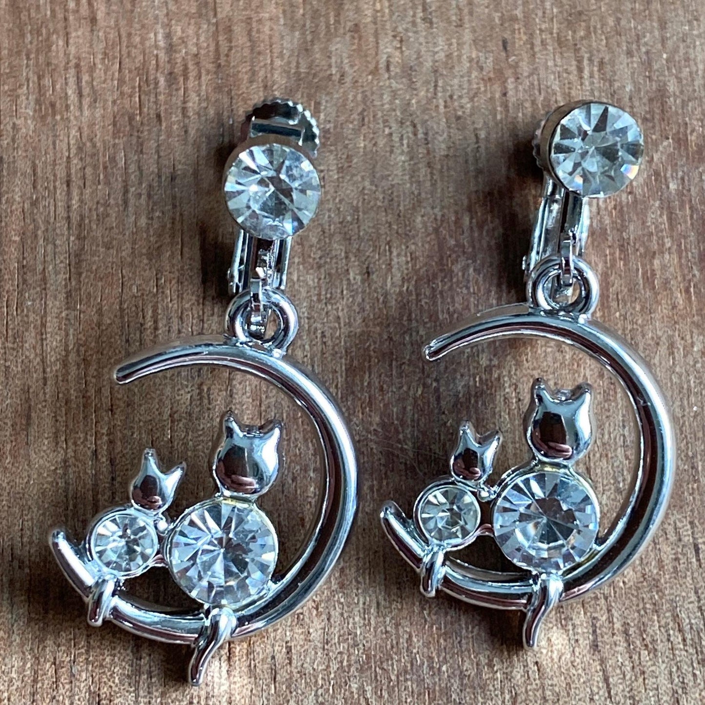 Dangling silver rhinestone moon and kitten clip on earrings (no piercing | screwback)