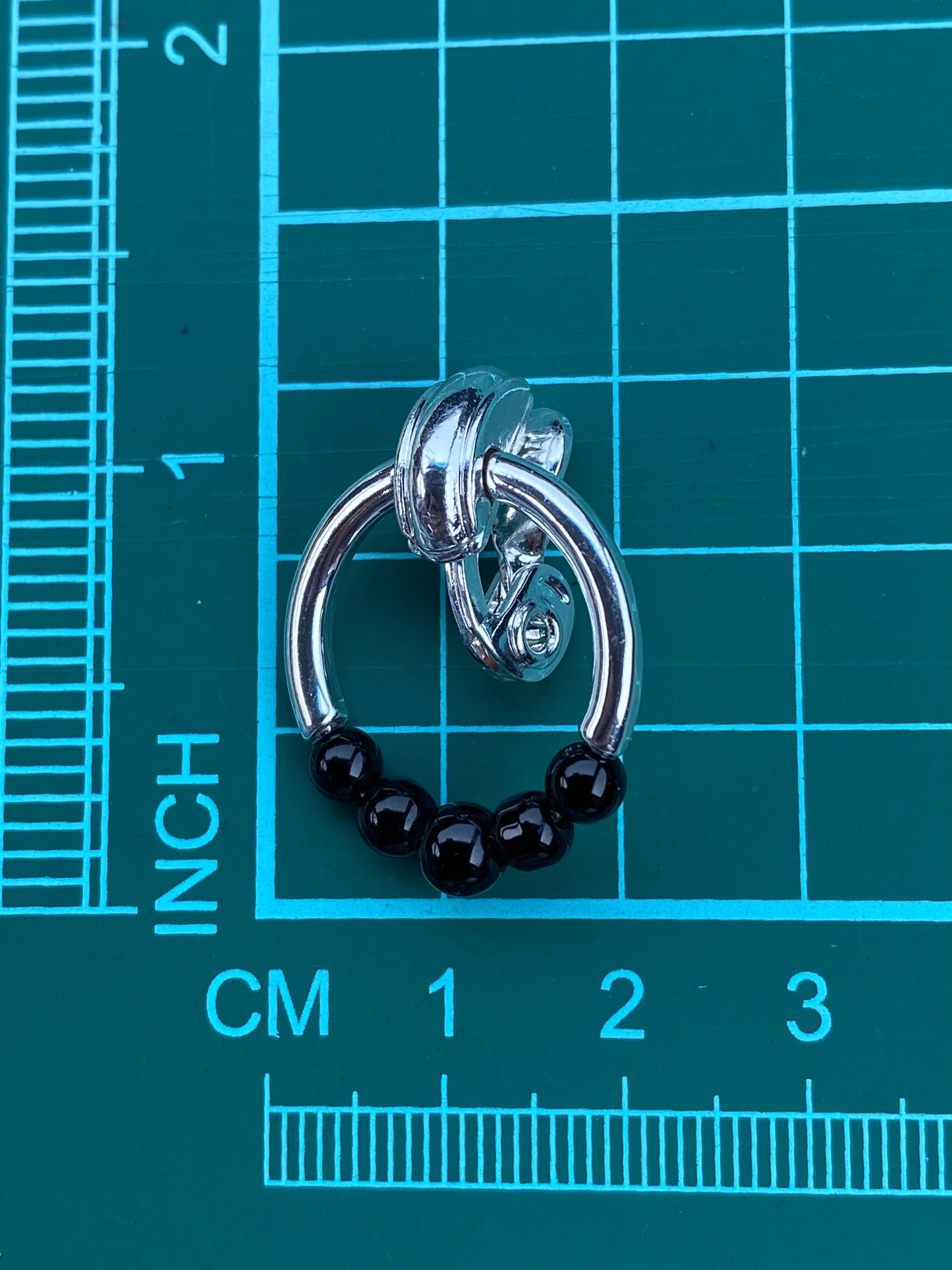 Vintage TJG clip on silver and black doorknocker earrings