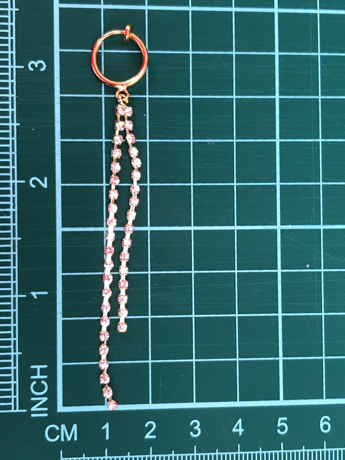 Adorable lightweight dangling rhinestone chains on clip on spring hoop earrings