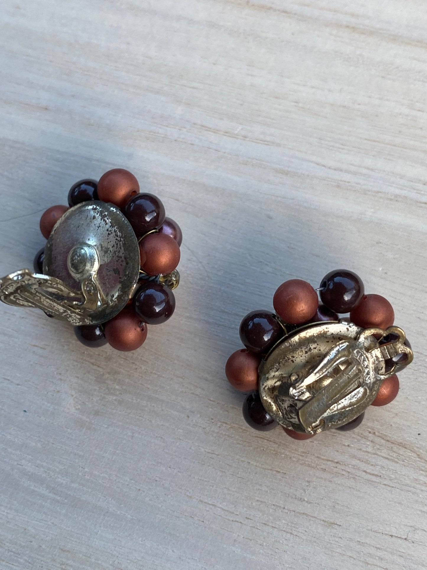 Vintage iridescent brown and orange cluster beaded clip on earrings.