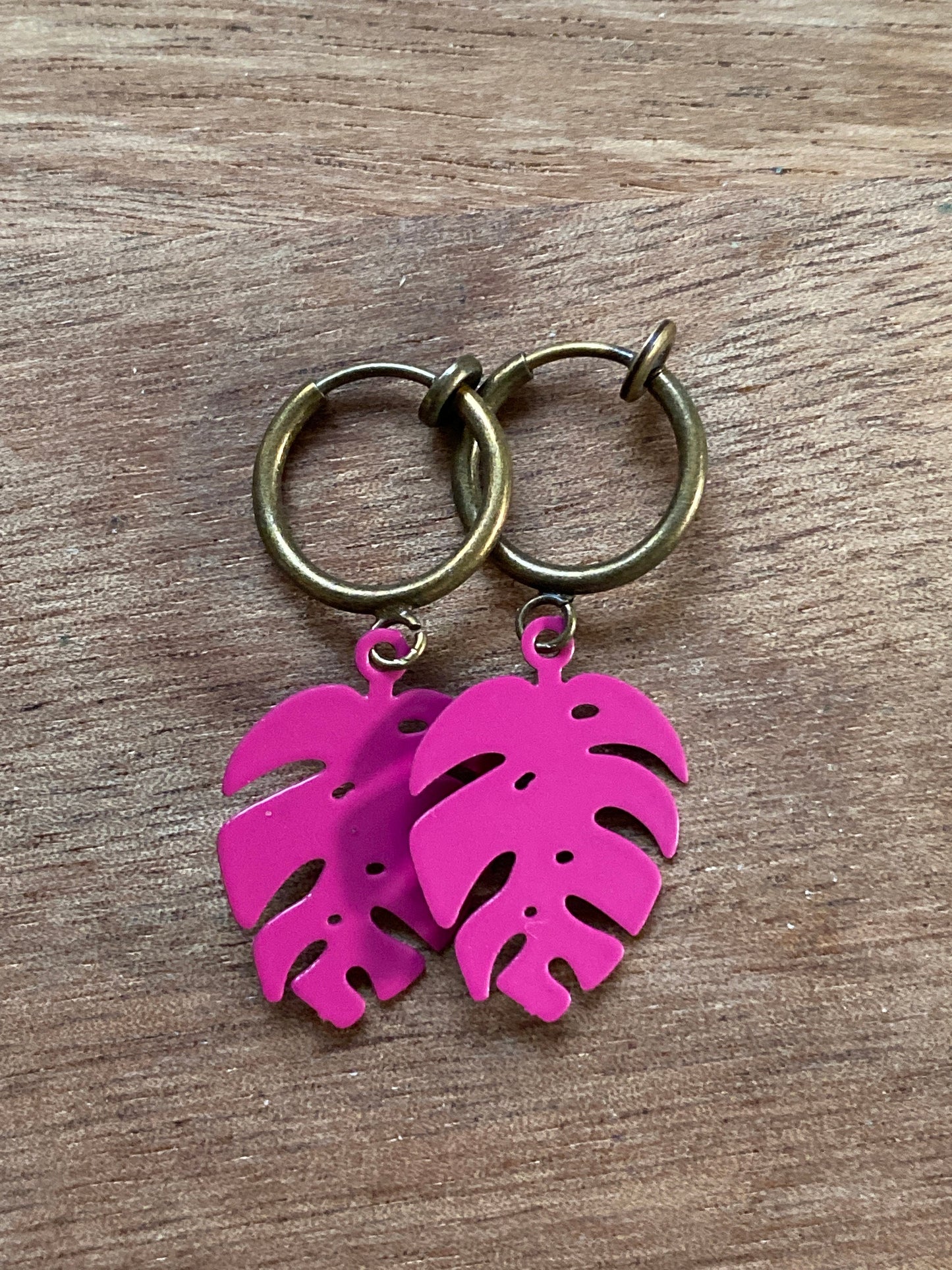 Tiny enamel monstera leaves on bronze spring hoop clip on earrings (no piercing)