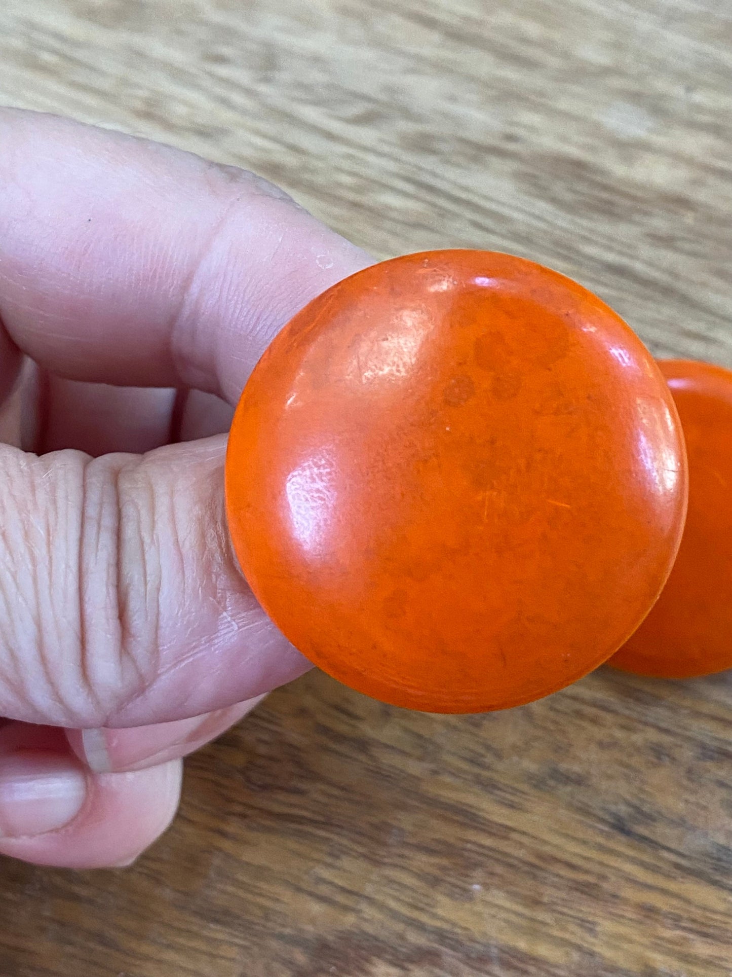 Vintage large orange button clip on earrings