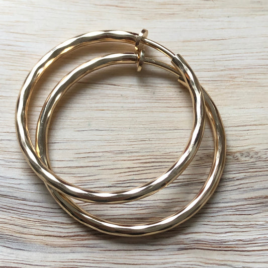 Golden spring hoop clip on earrings