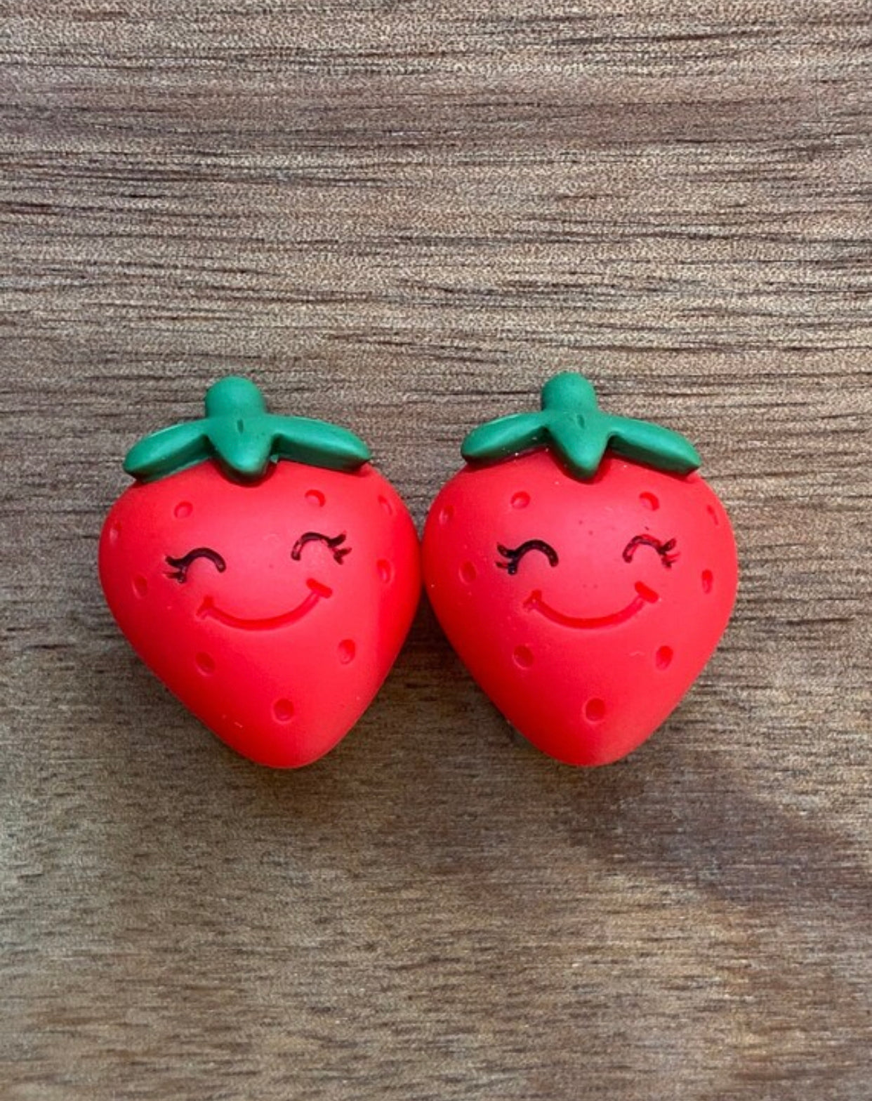 Smiling strawberry clip on earrings